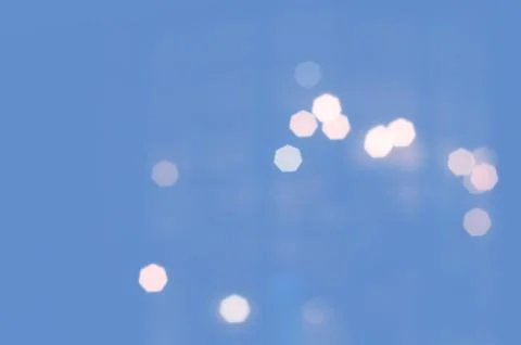 Blue bokeh abstract light blurred wallpaper background. Stock Photos