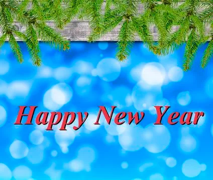 Blue bokeh background with pine tree and Happy New Year Stock Photos