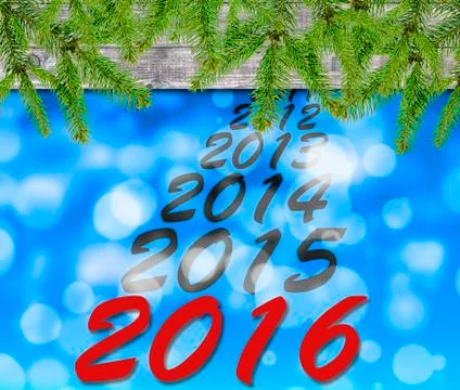 Blue bokeh background with pine tree and year countdown Stock Photos