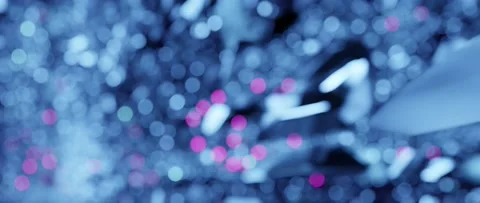 Blue bokeh blurred glitter balls of light abstract streaming loop background. Stock Footage 150879748