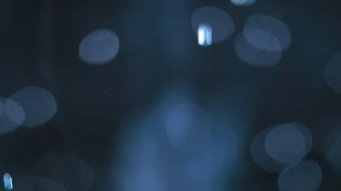 Blue bokeh bubbles floating in an abstract cold liquid Stock Footage 89308721