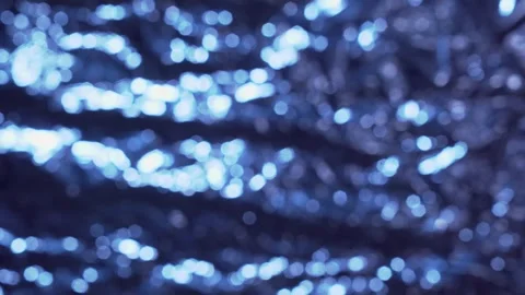 Blue Bokeh Camera Lens Blur Background with Soft Light Particles and Defocused Stock Footage 312323855