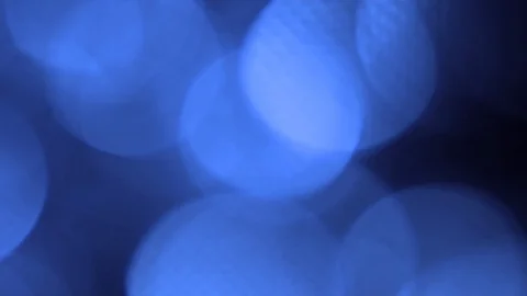 Blue bokeh light effect abstract background, animation of sparkle circles Stock Footage 125614571