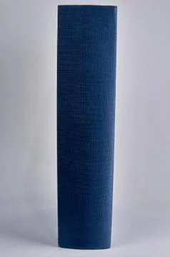 Blue book on white background with copyspace Stock Photos