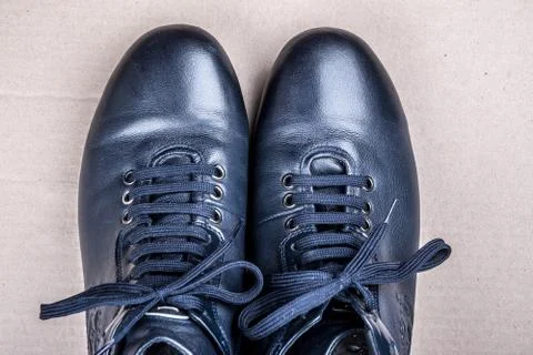 Blue boots on the ground Stock Photos