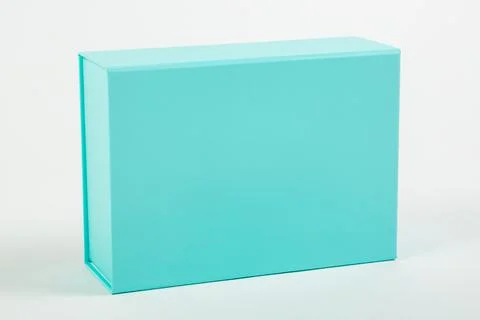 Blue box on a white background. Close-up. Stock Photos