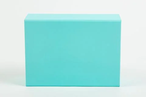 Blue box on a white background. Closeup. Stock Photos