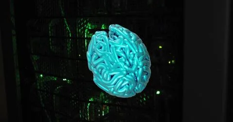 Blue brain model image over dark background with green lights Stock Photos