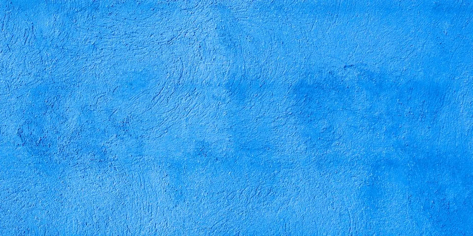 Blue brick wall for background Square block texture painted stones facade Stock Photos