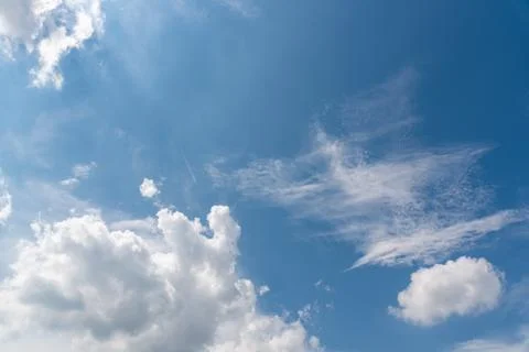 Blue bright sky with clouds Stock Photos
