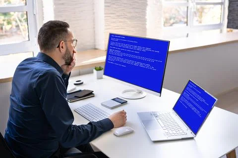 Blue BSOD Error At Computer Stock Photos