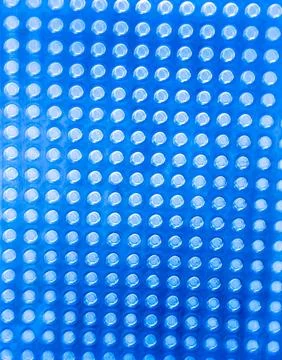 Blue Bubble Wrap Texture with Circular Dot Pattern Protection Material Back.. 写真素材