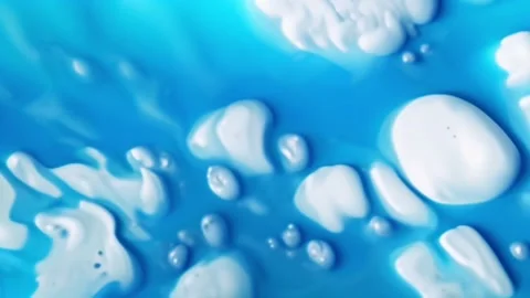 Blue bubbles foam on the water Stock Footage 263353698