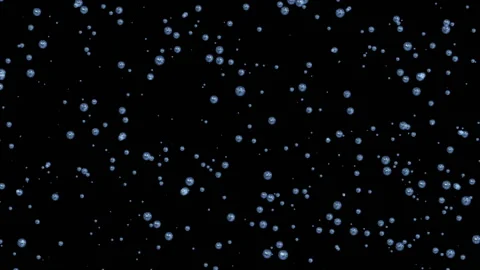 Blue bubbles rise up.Bubble Surges on Black Background. Video stock 98608186