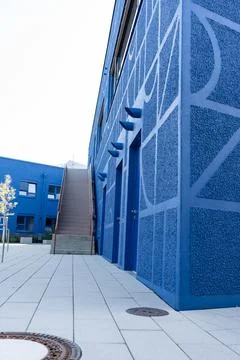Blue buildings with a pattern on the walls. Stock Photos