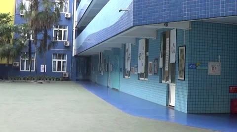 Blue buildings in a school, with long empty hallways Stock Footage 44215309