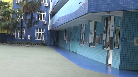 Blue buildings in a school, with long empty hallways Stock Footage 44215418