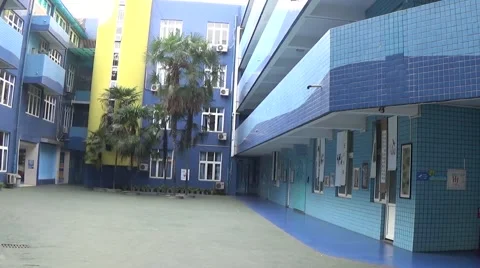 Blue buildings in a school, with long empty hallways Stock Footage 44215575