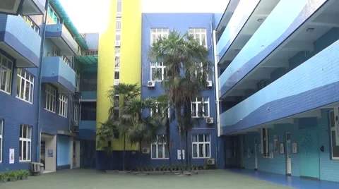 Blue buildings in a school, with long empty hallways Stock Footage 44215681