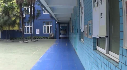 Blue buildings in a school, with long empty hallways Stock Footage 44215913