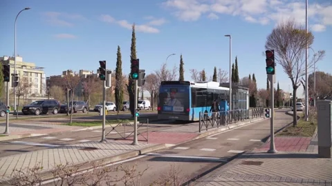 Blue bus stopped at bus stop in  Sanchinarro Madrid Stock Footage 304161807