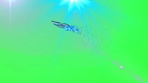 Blue butterfly dissolving into particles against a radiant green background Stock Footage 344189099
