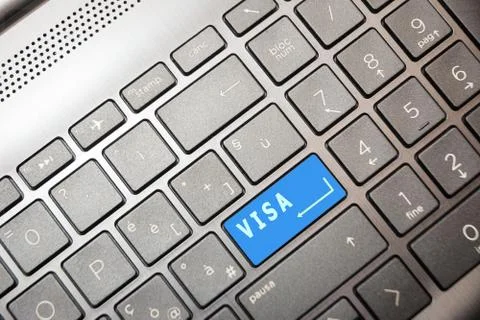 Blue button on the computer with the text Visa Stock Photos