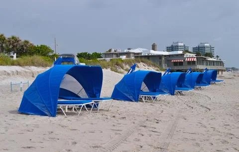 Blue Cabanas at the Beach Stock Photos