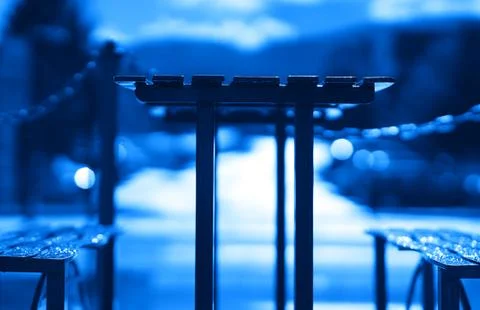 Blue cafe table with benches backdrop Foto stock