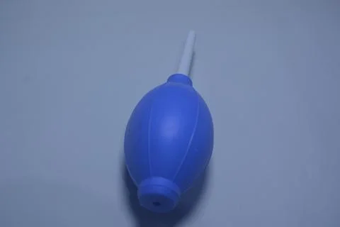 Blue camera lens blower, camera cleaning tool, isolated on white background Stock Photos