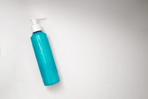Blue can of shampoo on a white background Stock Photos