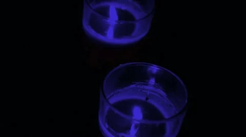 Blue Candles on black background Video stock 16135380