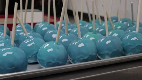Blue Candy Apples on a tray Stock Footage 250193388