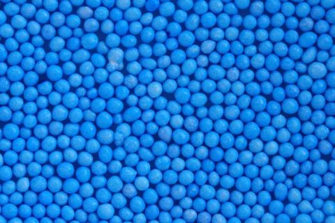 Blue candy sprinkle layer Stock Photos