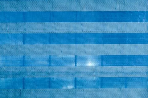 Blue Canvas Background Embroidery Pattern For Interior Decoration. Stock Photos