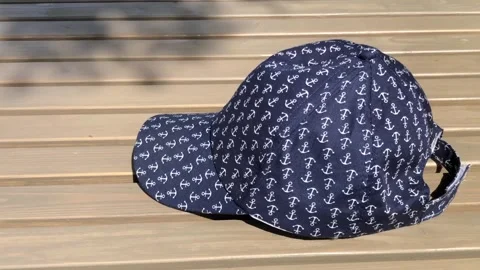 Blue cap with anchors on deck 스톡 동영상 314335394