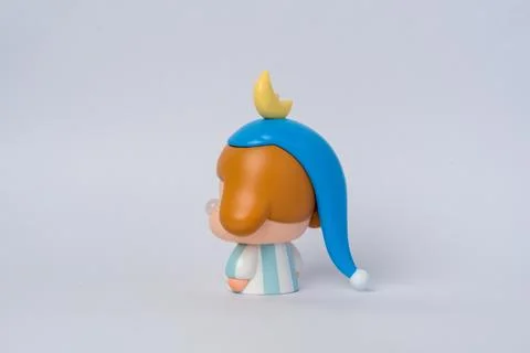 Blue cap with yellow tip Stock Photos