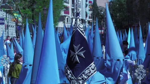 Blue Capirotes During Semana Santa Procession in Seville Stock Footage 336015159
