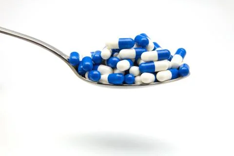 Blue capsules Stock Photos