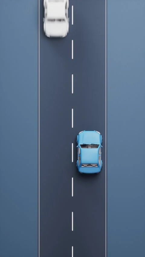 Blue car drives and changes lanes as another vehicle performs an overtake m.. Vidéo 327524239