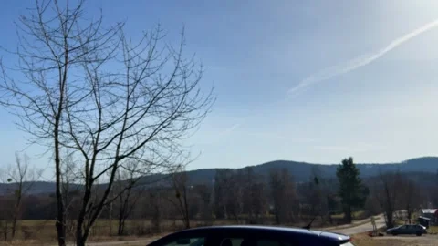 Blue car in field parking Stock Footage 330167171