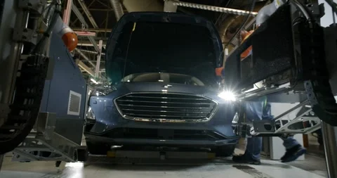Blue Car at Final Inspection Station, Automotive Assembly Plant, Wide Shot Stock Footage 340300941