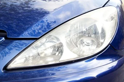 Blue car front light Stock Photos