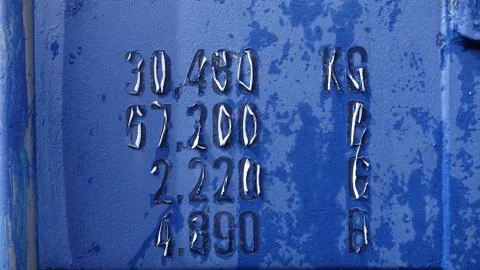 Blue cargo container wall text Stock Photos