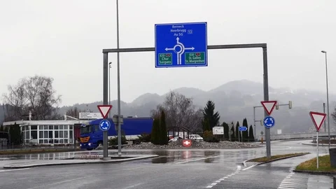 Blue cargo truck going through roundabout. Stock Footage 82009882