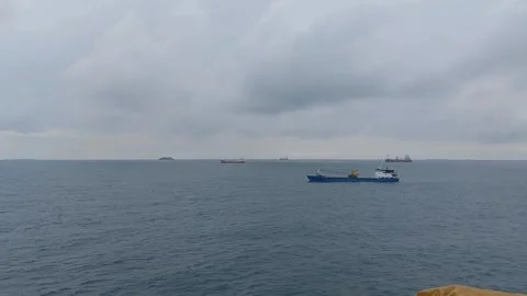 Blue cargo vessel crossing calm ocean waters, Indonesia. Stock Footage 345974882