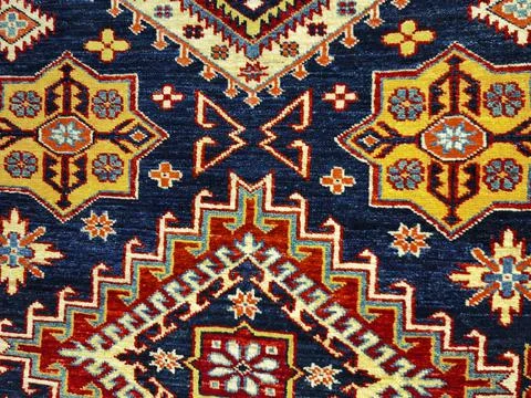 Blue carpet pattern very nice as a background texture Stock Photos