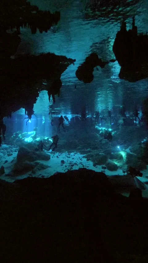 Blue cavern opening below a dark rock ceiling Stock Footage 341361513