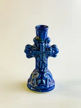 Blue ceramic candlestick on a white background. Stock Photos