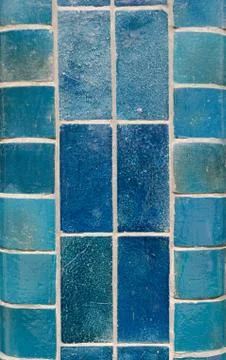 Blue ceramic tiles on a column in different shades including aqua, turquoise, Stock Photos